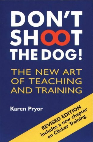 Book cover for Don't Shoot the Dog! by Karen Pryor on a blue background.
