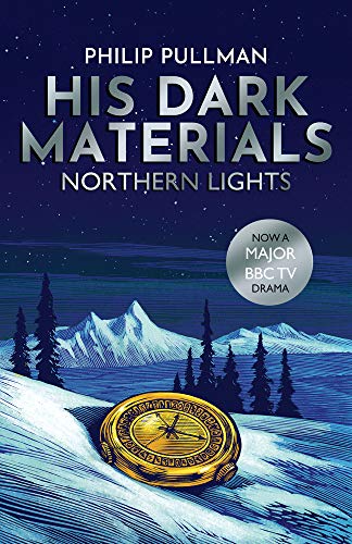 Book cover for "Northern Lights" with a gold compass in snow.