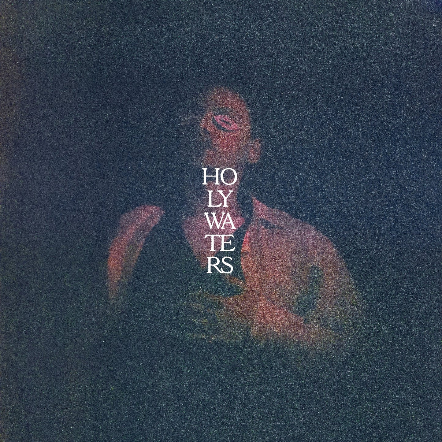 CD cover for Puma Blue’s “Holy Waters” featuring a portrait and text.