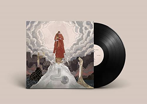 Purity Ring “Womb” vinyl record with illustrated cover art of a figure.