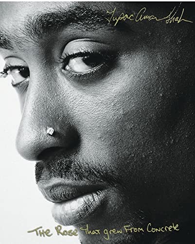 Close-up of a Black man’s face in grayscale, with a nose ring.