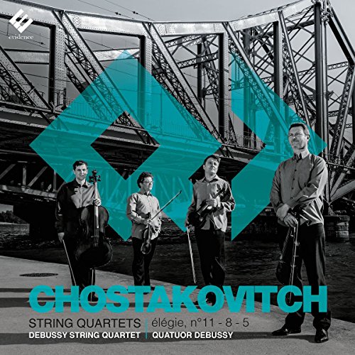String quartet posing before a large, grey metal bridge, CD cover.