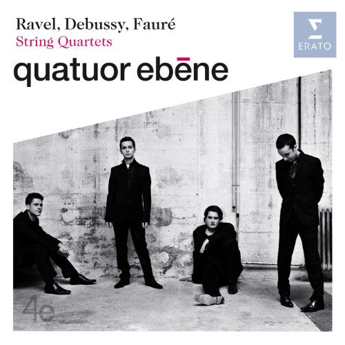 CD cover featuring four musicians in dark suits against a textured wall.