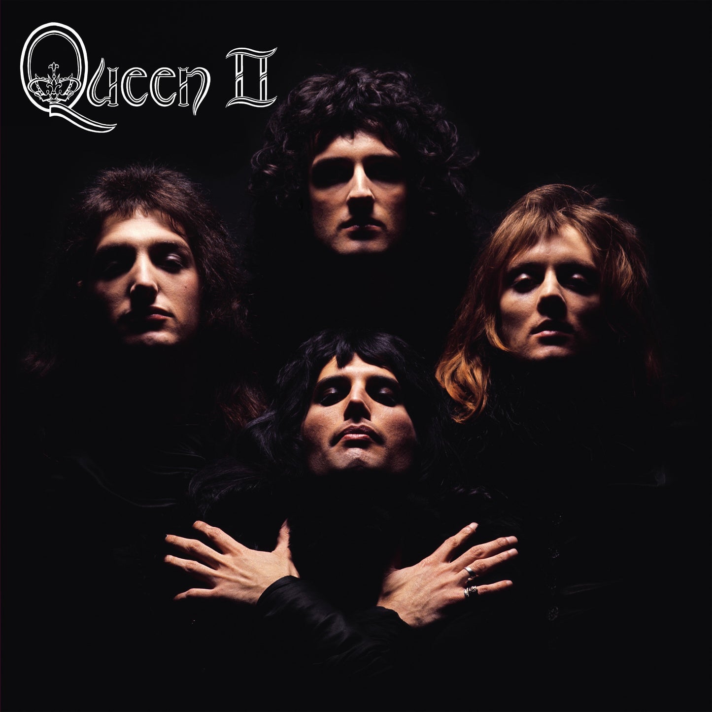 Queen II album cover featuring the band members in black and white.
