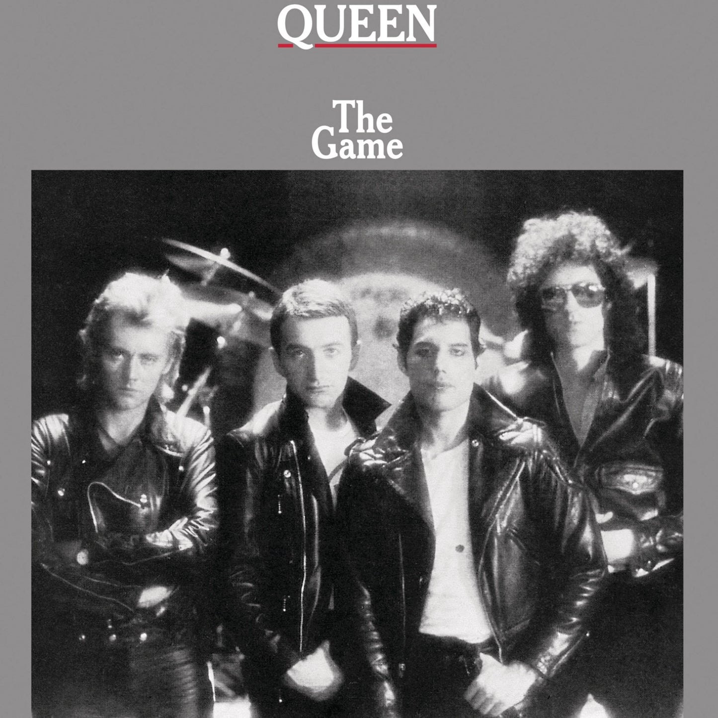 Queen band members in black and white, album cover for "The Game".