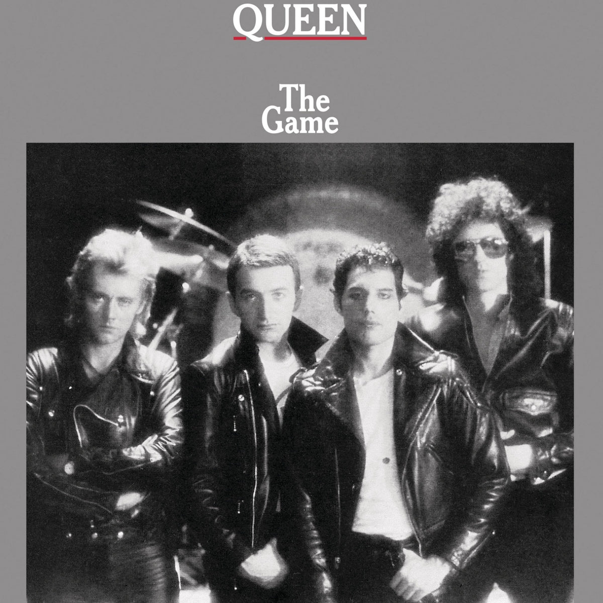 Queen band members in black and white, album cover for "The Game".