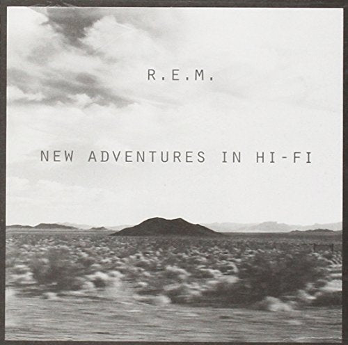 R.E.M. album cover, "New Adventures In Hi-Fi," with desert landscape.