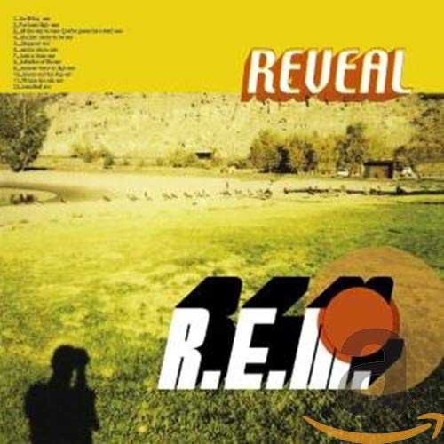 R.E.M. “Reveal” CD cover: yellow landscape with band name and title.