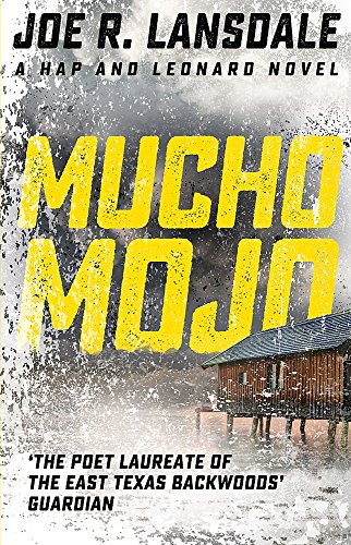 Book cover: “Mucho Mojo” with weathered yellow text and a rural cabin.