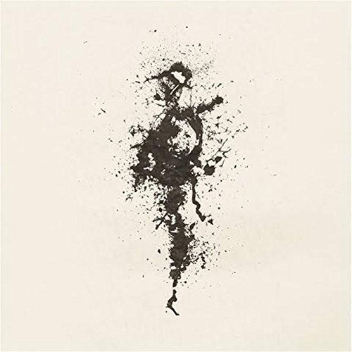 Abstract black ink splatter on a light beige vinyl record cover.