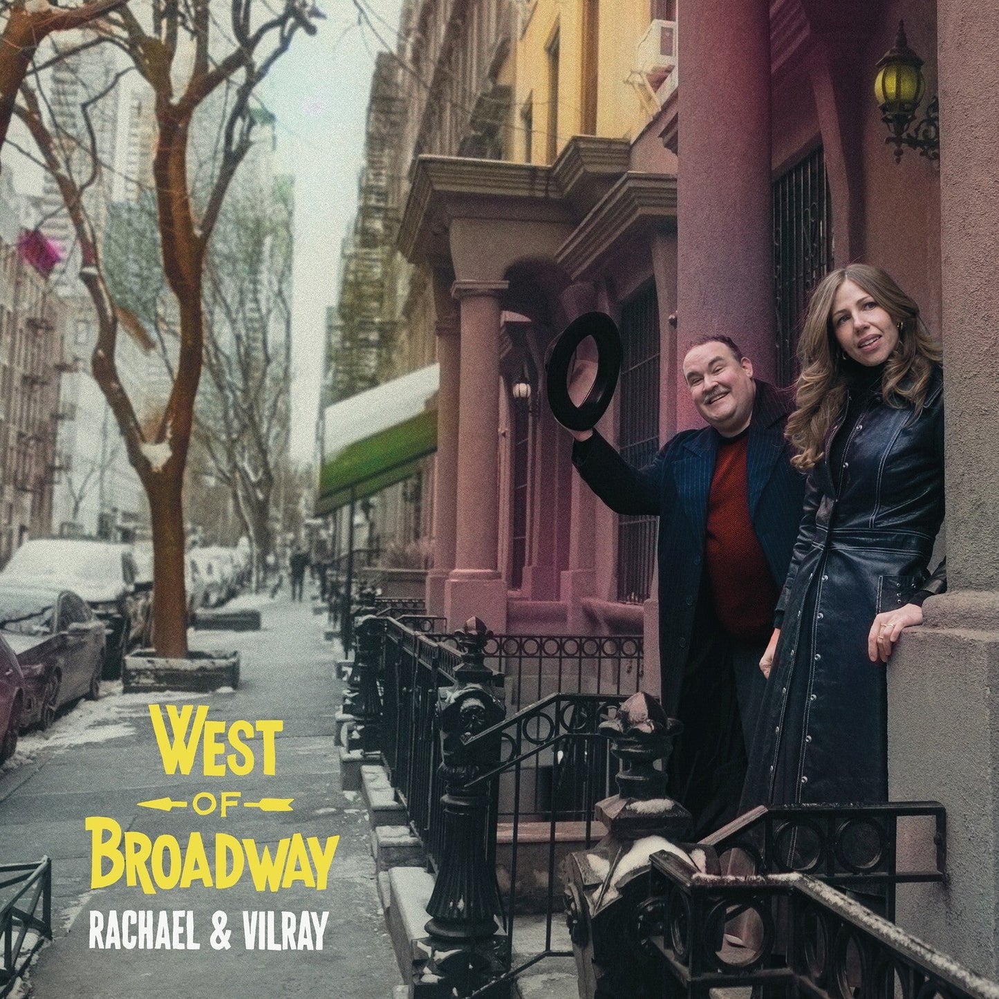 Album cover featuring two people posing on a city street.