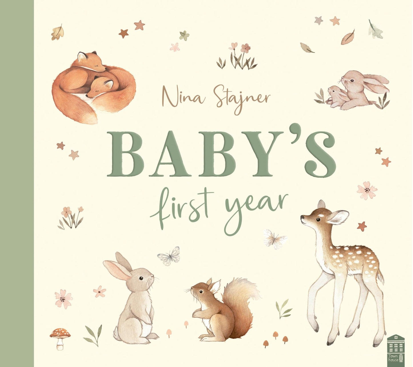 Book cover titled Baby's First Year featuring watercolor illustrations of woodland animals and flowers.