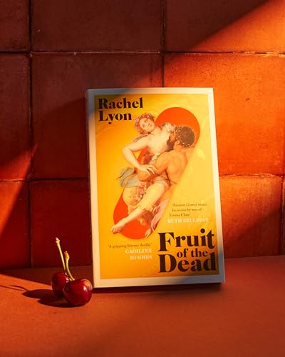 Book cover for Fruit of the Dead by Rachel Lyon with two cherries alongside.