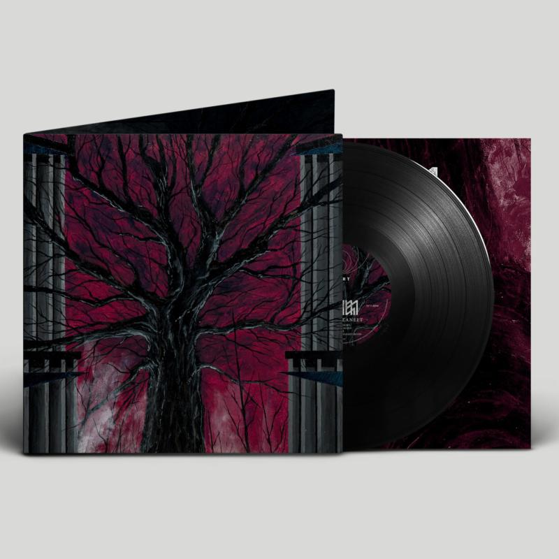 Vinyl record with dark, atmospheric cover art featuring a bare tree.