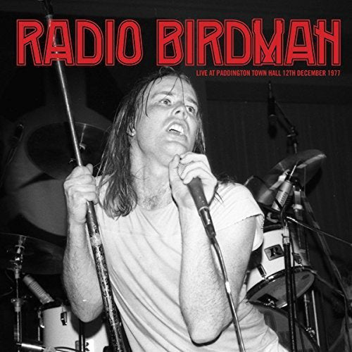 Black and white album cover featuring a singer with a microphone.