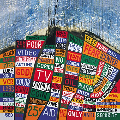 Radiohead’s “Hail to the Thief” CD cover: collage of text on blue background.