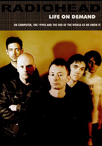 Radiohead band portrait on DVD cover, golden background, serious expressions.