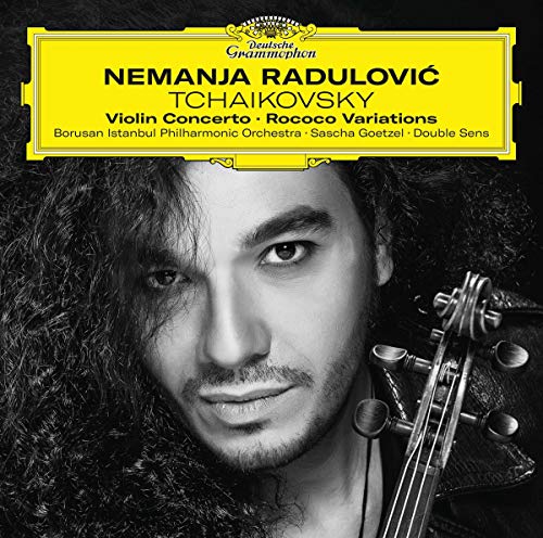 Black and white portrait of violinist Nemanja Radulović holding a violin, yellow Deutsche Grammophon header.