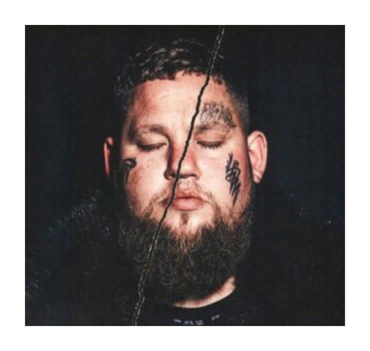 Rag'n'Bone Man portrait with facial markings and a dark, textured background.