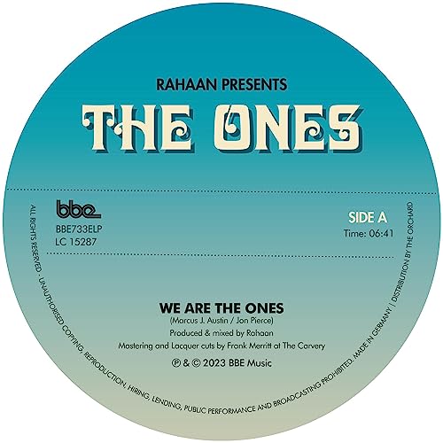 Turquoise vinyl record label with text: "The Ones" and track listing details.