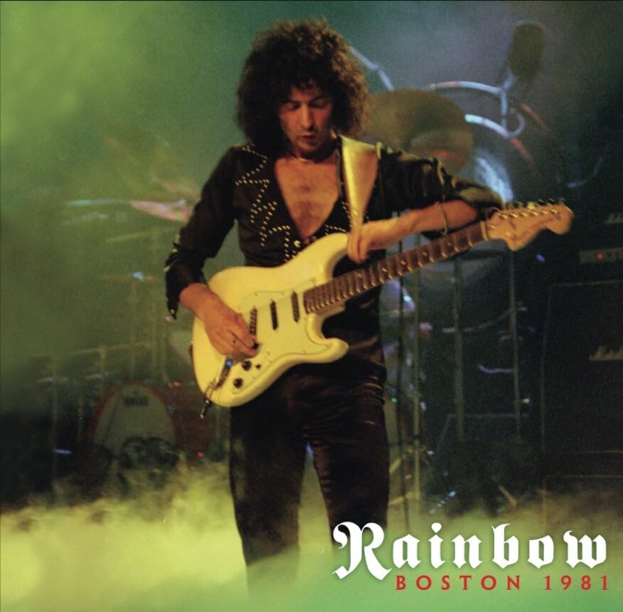 Rainbow album cover, Ritchie Blackmore playing guitar onstage, Boston 1981.
