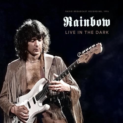 Rainbow album cover featuring guitarist Ritchie Blackmore playing a white guitar.