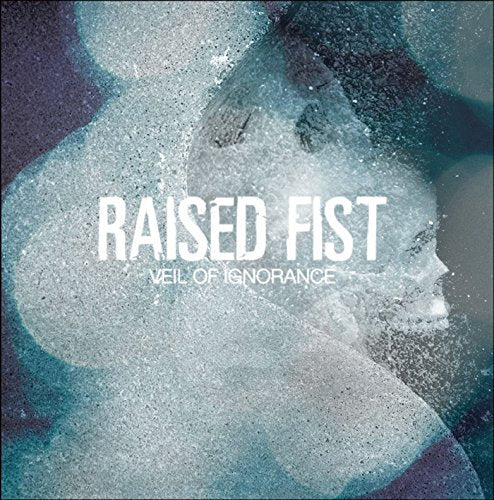 "CD album cover with 'Raised Fist - Veil of Ignorance' text and abstract blue background."