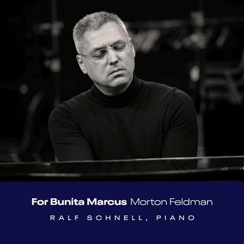 Black and white portrait of Ralf Schnell at a piano, CD cover.