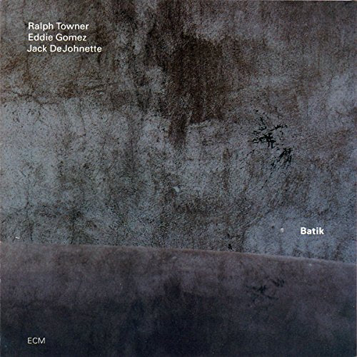 Album cover with dark textured background and white text listing artists and title "Batik".