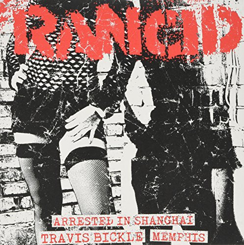 Black and white punk record cover featuring a person in fishnets against a brick wall.