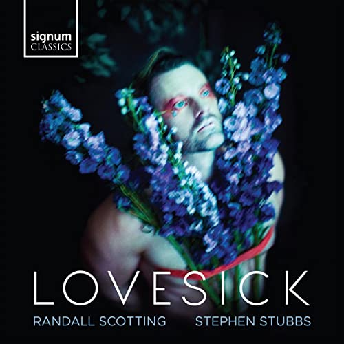 CD cover: Man with flowers, text “Lovesick” and artist names.