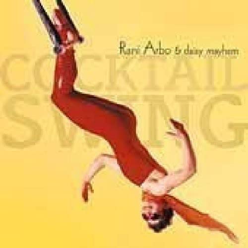 CD cover featuring a woman in red performing an acrobatic pose.