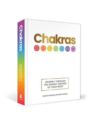 White book cover with “Chakras” title and seven colored circles.