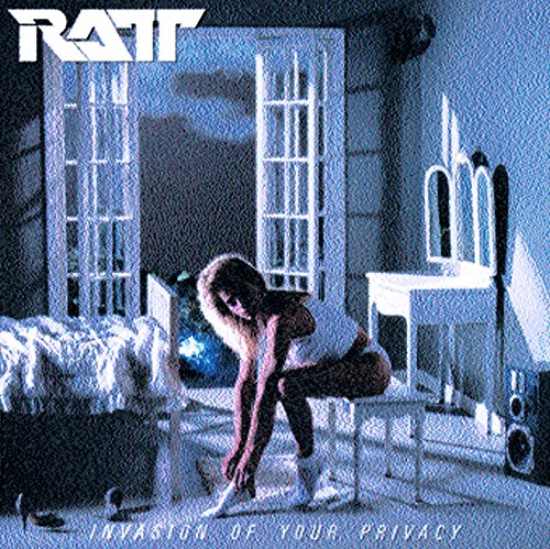 Ratt album cover: woman with long hair in a mirrored room.