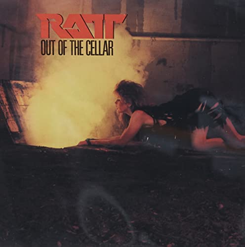 Ratt album cover: woman emerging from a bright, smoky cellar opening.