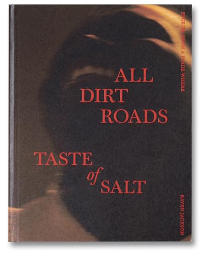 Book cover: "All Dirt Roads Taste of Salt" with a shadowed face.