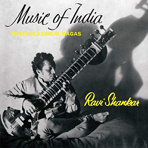Ravi Shankar playing a sitar on a black and white album cover.