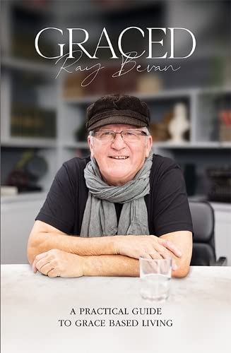 Book cover featuring a smiling older man with a cap and scarf.