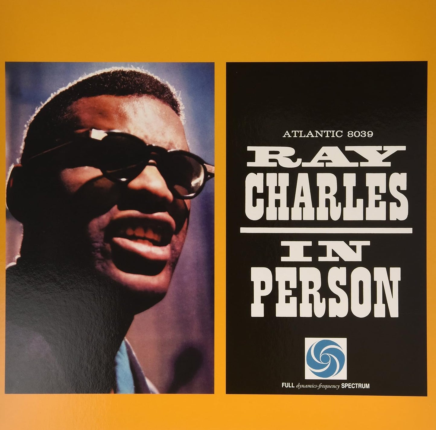 Ray Charles album cover, "In Person," featuring a portrait and text.