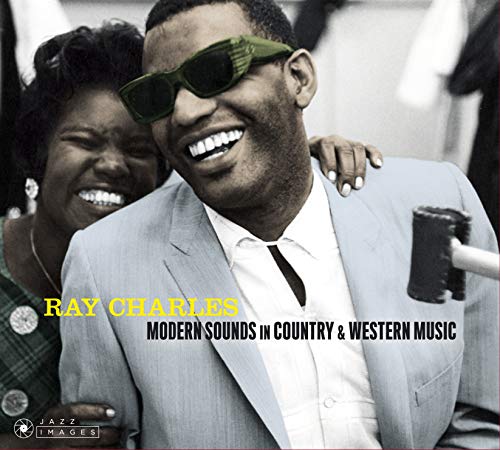 Ray Charles smiling, wearing sunglasses and a suit, album cover art.