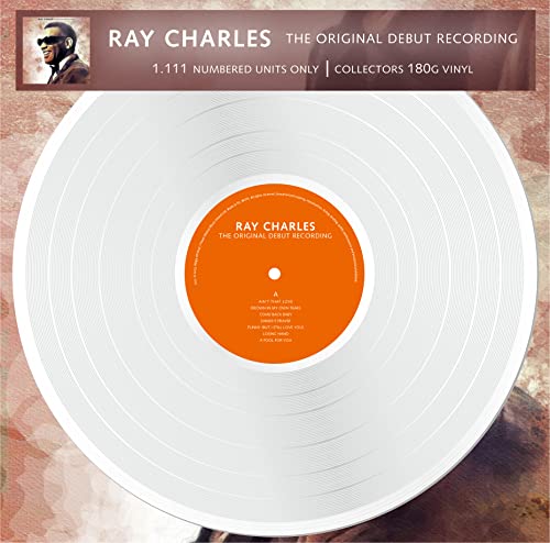 White vinyl record by Ray Charles with orange label and tracklist.