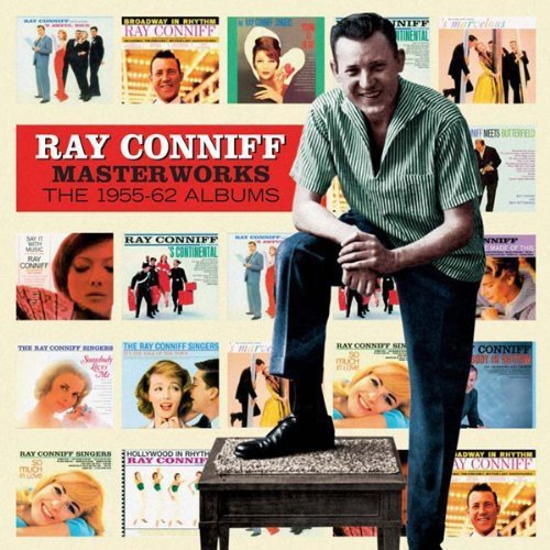 Ray Conniff standing by a stool, surrounded by a collage of his album covers.