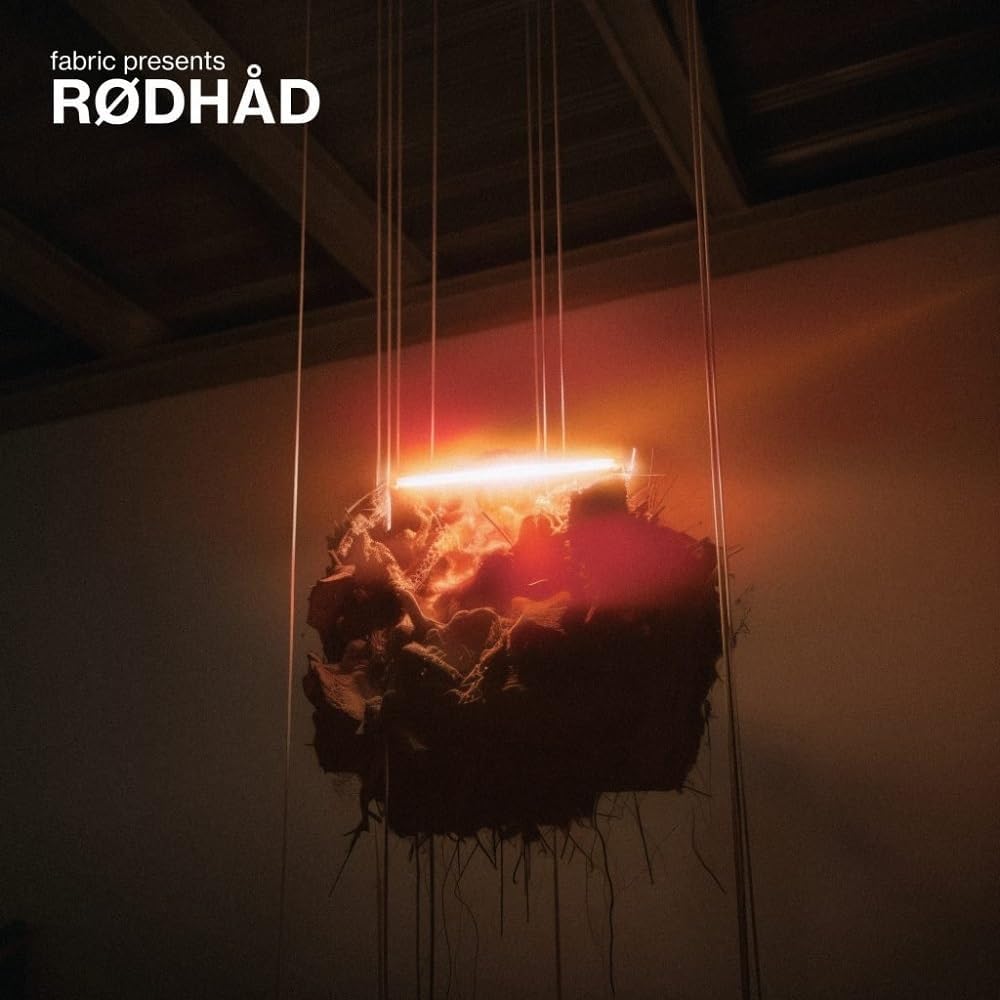 Album cover for Rødhåd - Fabric Presents, featuring abstract red sculpture.