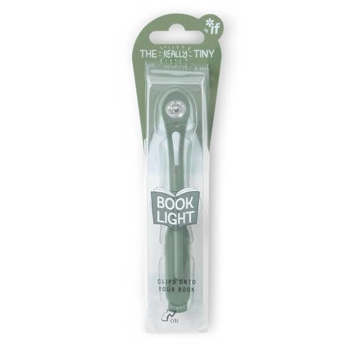 A fern green clip-on book light in its original retail packaging.