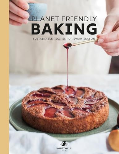 Cookbook cover with fruit cake, spoon, and title “Planet Friendly Baking”.