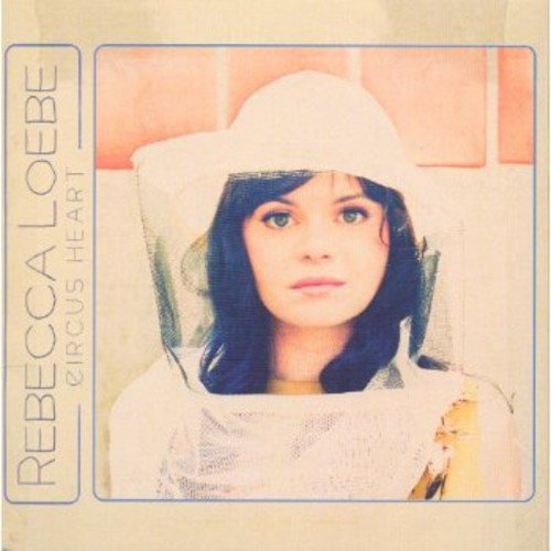Album cover with a beekeeper and text "Rebecca Loebe Circus Heart".