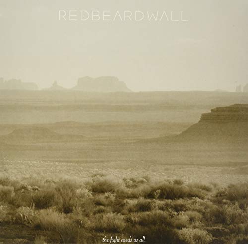 Sepia-toned desert landscape with mesas under a hazy sky, featuring band and album text.