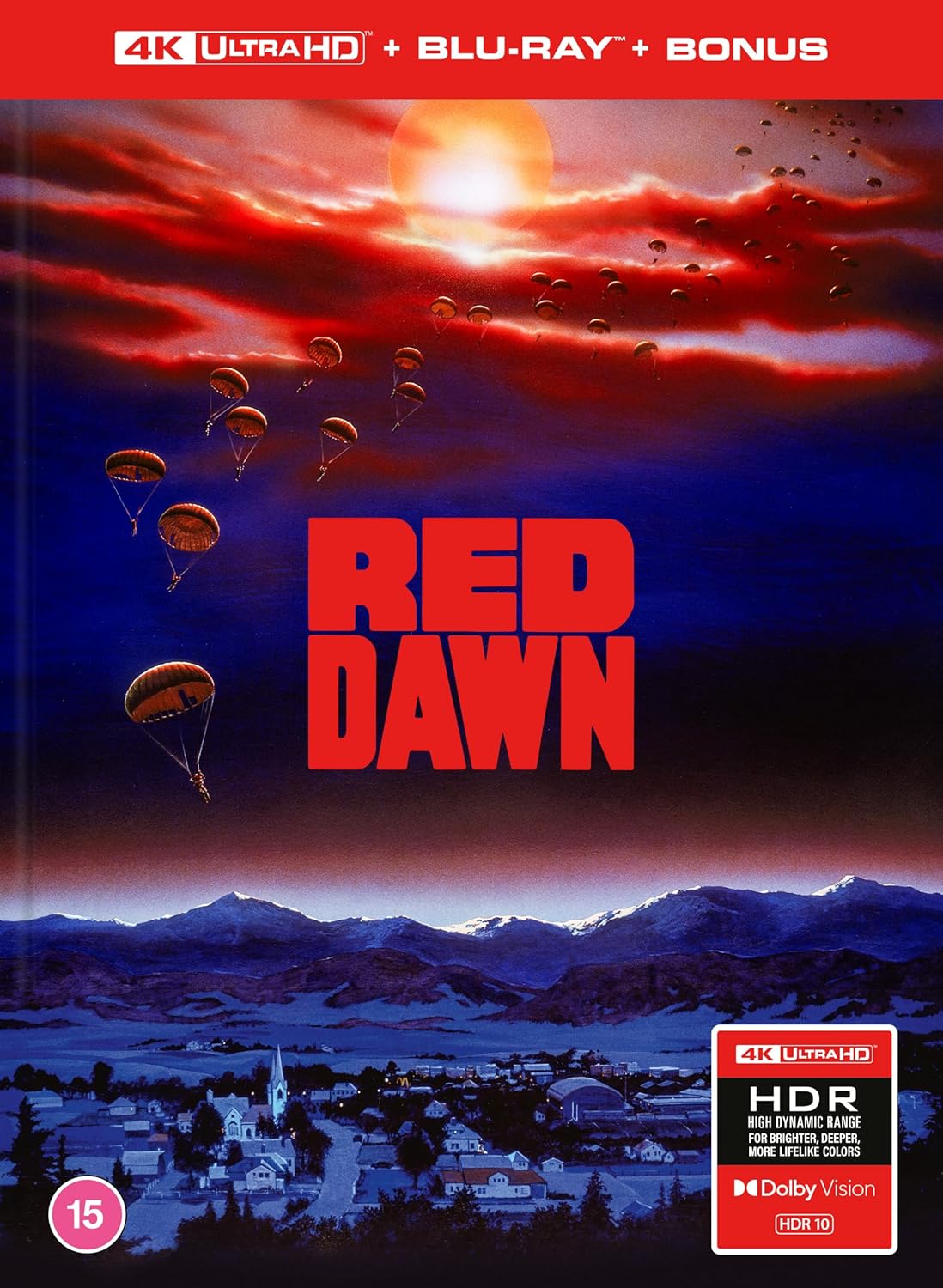 “Red Dawn” movie cover with parachuting soldiers over a small town.