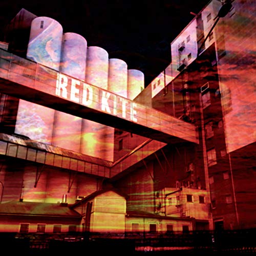 Red Kite album cover: industrial buildings illuminated with red and white text.