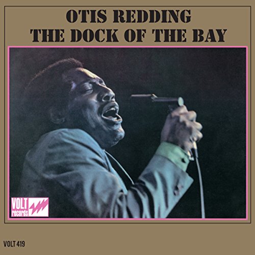 Otis Redding singing into a microphone, album cover for "The Dock of the Bay.